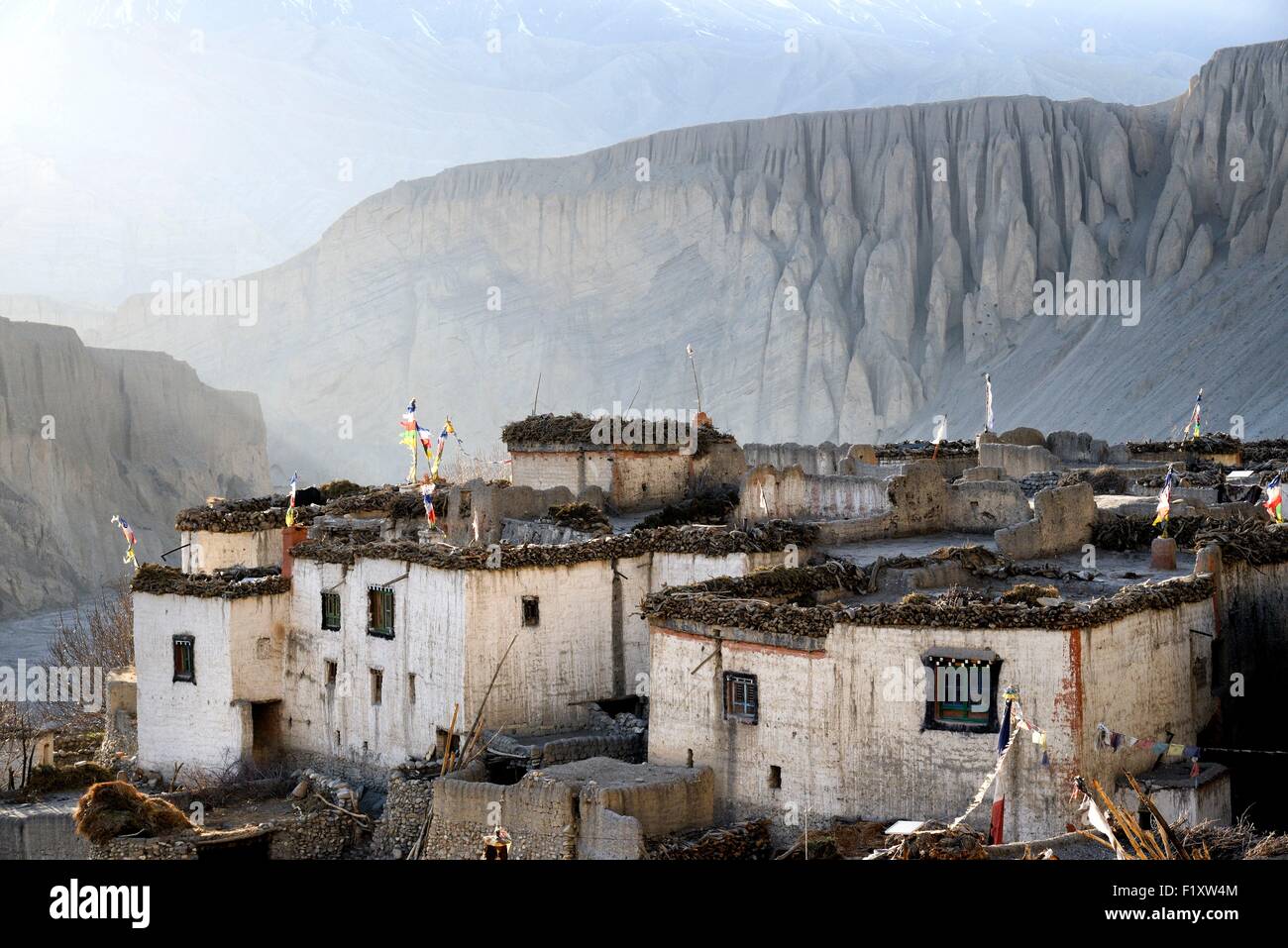 Nepal, Gandaki zone, Upper Mustang (near the border with Tibet), houses in the village of Tangge at sunset; Stock Photo