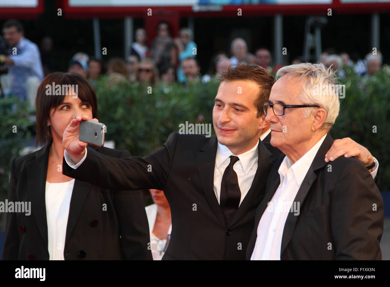 Venice, Italy. 08th Sep, 2015. A man make a photo at Marco Bellocchio with cellular phone during Blood of my blood Premiere during the 72nd Venice Film Festival on 08 September, 2015 in Venice Credit:  Andrea Spinelli/Alamy Live News Stock Photo