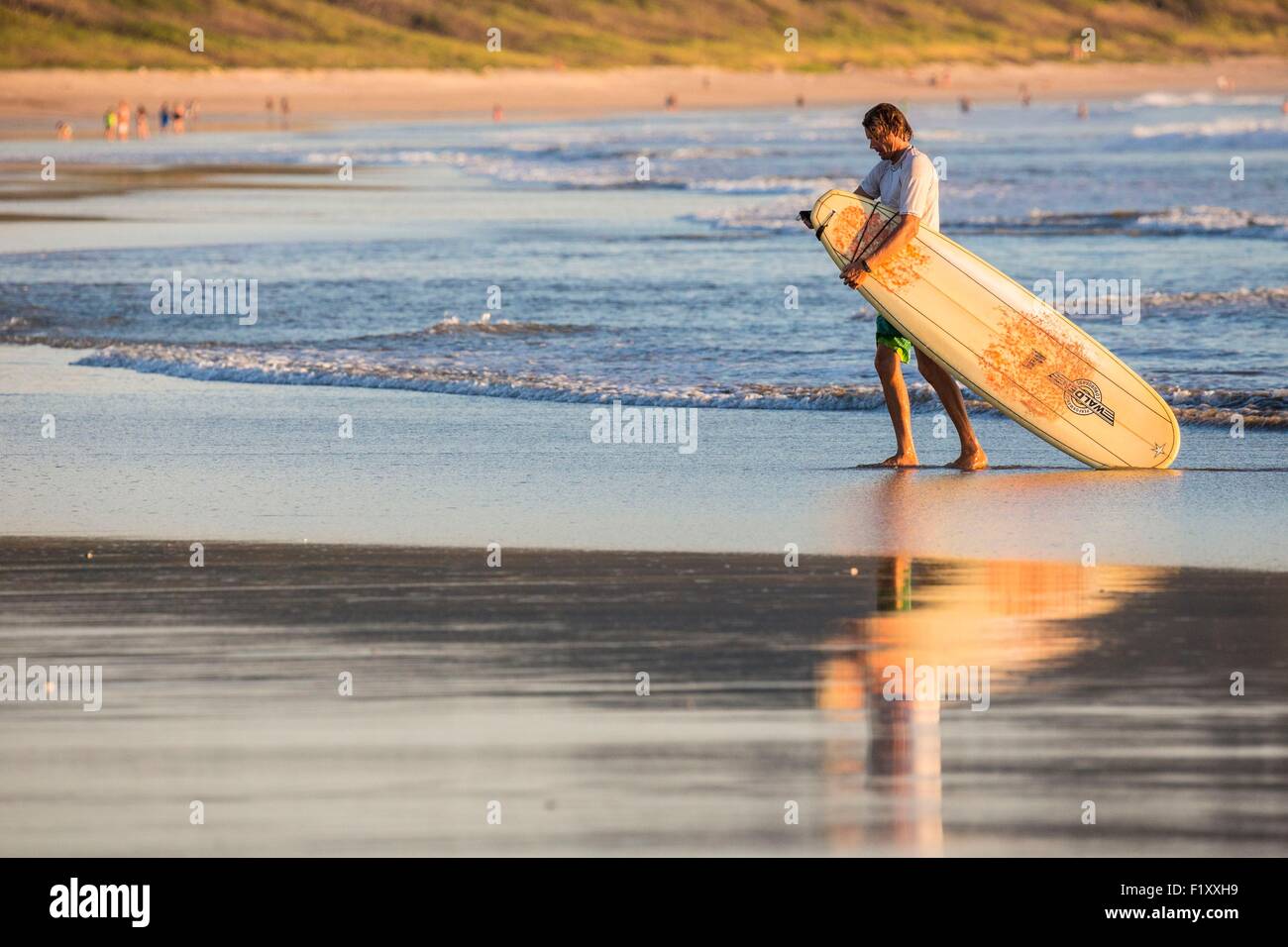 Costa Rica, Guanacaste province, Nicoya Peninsula, near Tamarindo, Playa Grande, surfer Stock Photo