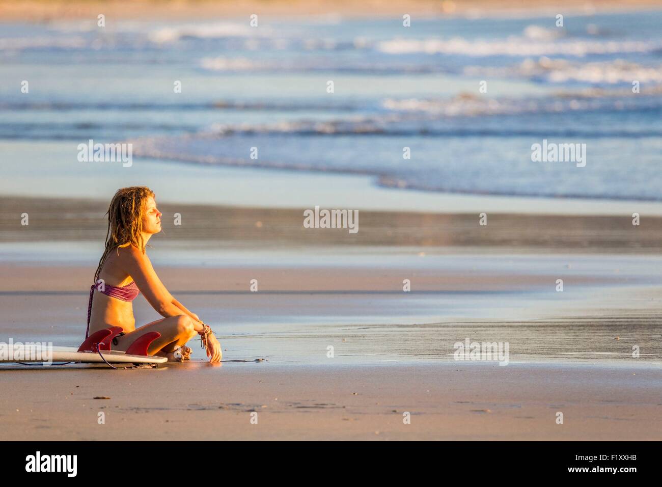 Costa Rica, Guanacaste province, Nicoya Peninsula, near Tamarindo, Playa Grande, surfer Stock Photo