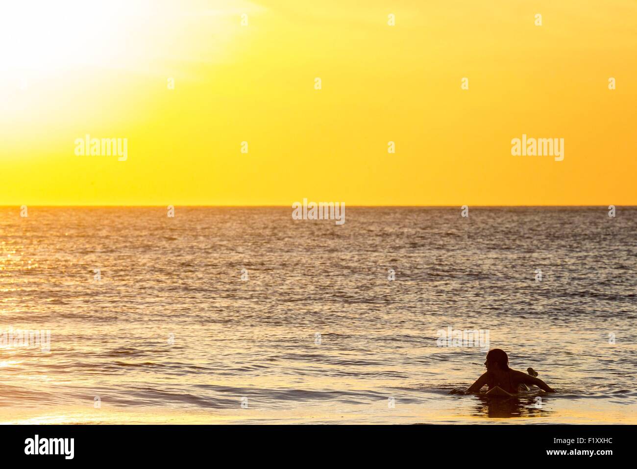 Costa Rica, Guanacaste province, Nicoya Peninsula, near Tamarindo, Playa Grande, surfer Stock Photo