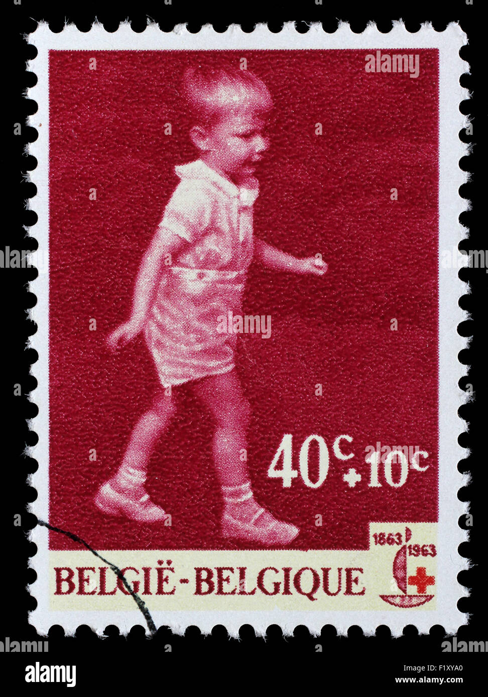 Stamp printed in Belgium is dedicated to the 100th anniversary of the International Red Cross, circa 1963 Stock Photo