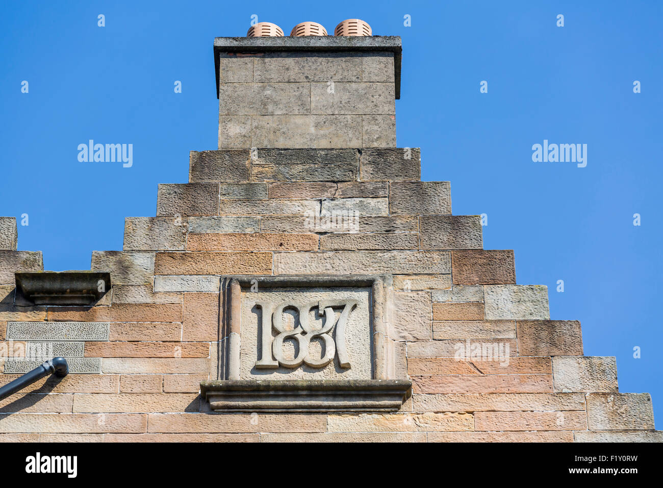 Merchant City Glasgow. An 1887 datestone on a house chimney, Scotland, UK Stock Photo