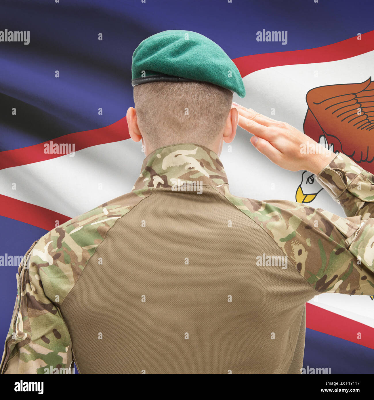 Soldier in hat facing national flag series - American Samoa Stock Photo