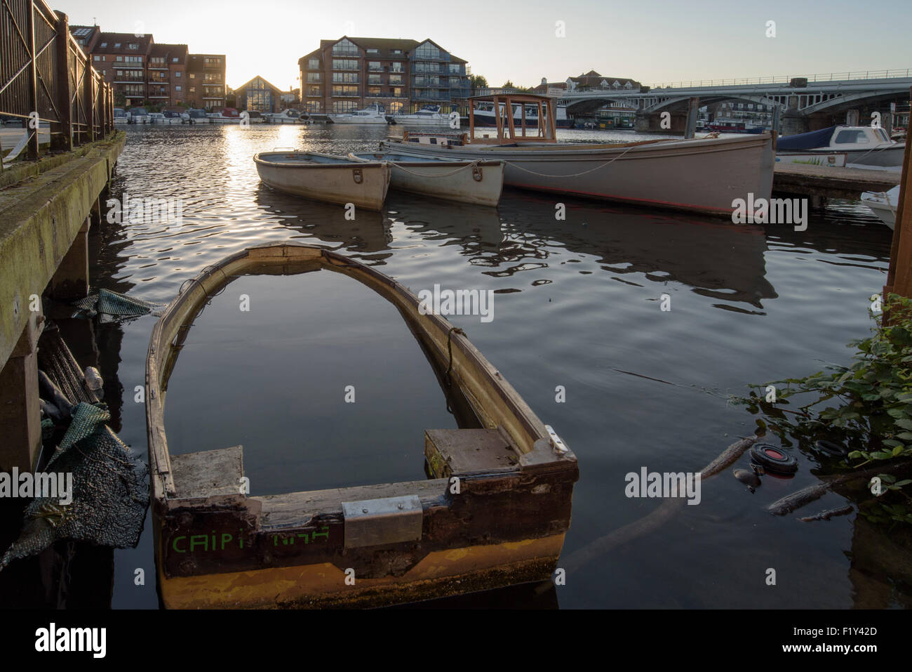 Sunken rowing boat on the River Thames at Kingston-upon-Thames Stock Photo