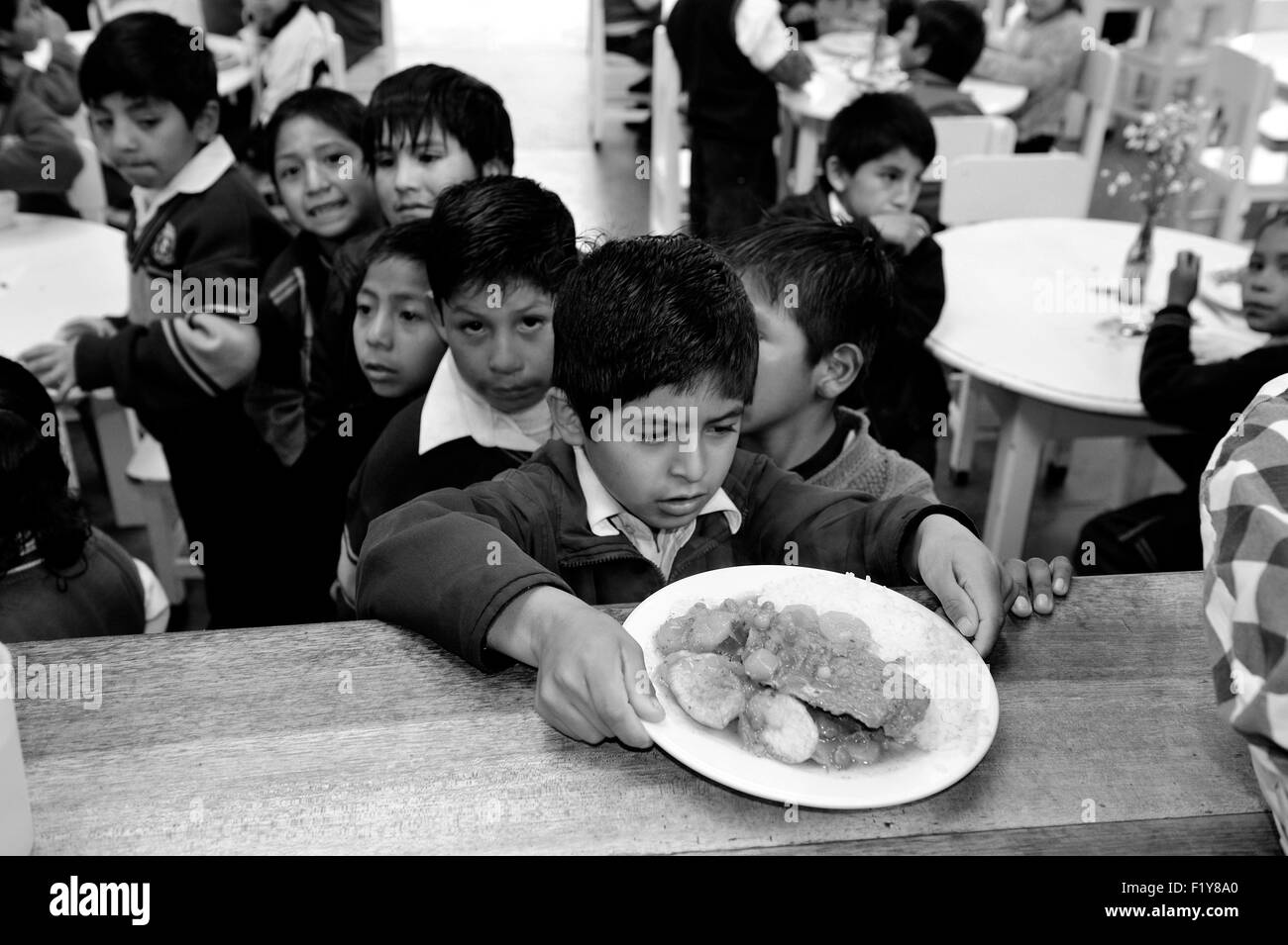 Peru, Cuzco Province, Cuzco, lunch service in one of the restaurants of the Ninos Unidos Peruanos Charitable Foundation which is in charge of 600 street children and provides education, care and food Stock Photo
