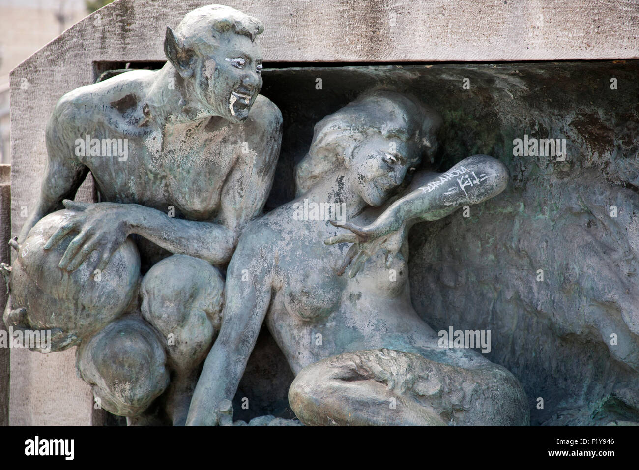 Sculpture of the devil and a maiden near the Galliera gate  - Porta Galliera - Bologna, Italy Stock Photo