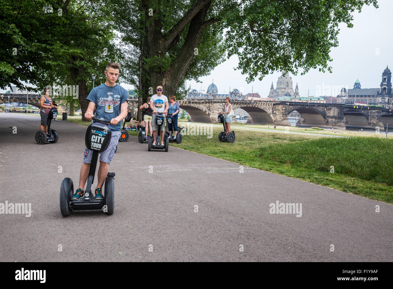 Town inspection by Segway on the Elbe cycle track, Dresden Old Town view, Stadtbesichtigung per Segway auf dem Elberadweg, Dresd Stock Photo