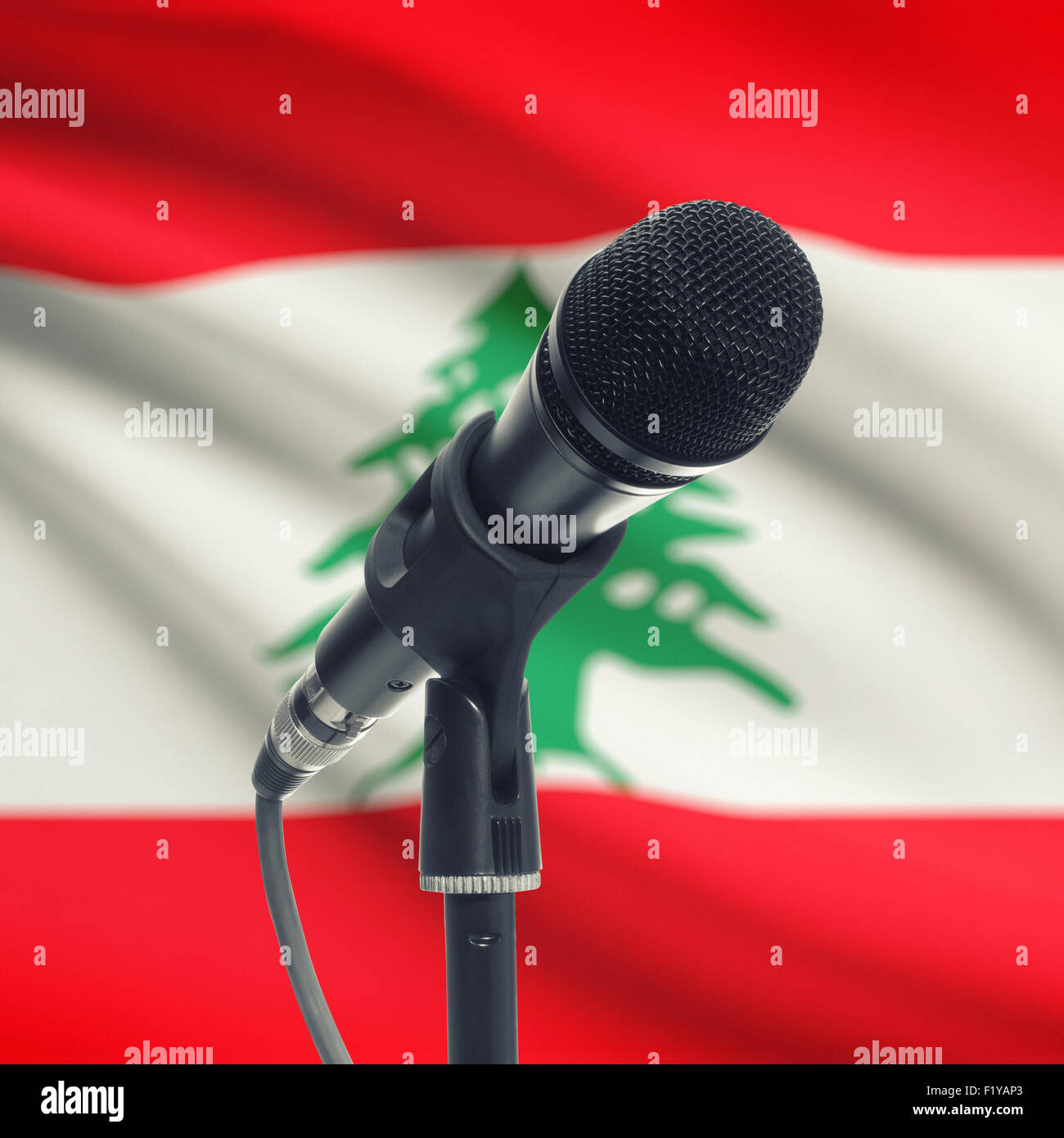Microphone with national flag on background series Lebanon Stock