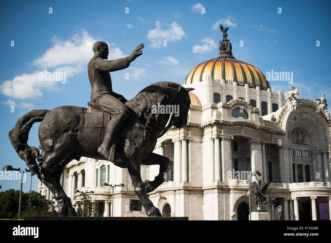 The Palacio de Bellas Artes (Palace of Fine Arts) is Mexico's most important cultural center. It's located on the end of Alameda Central park close to the Zocalo in Centro Historico. The building was completed in 1934 and features a distinctive tiled roof on the domes. Stock Photo