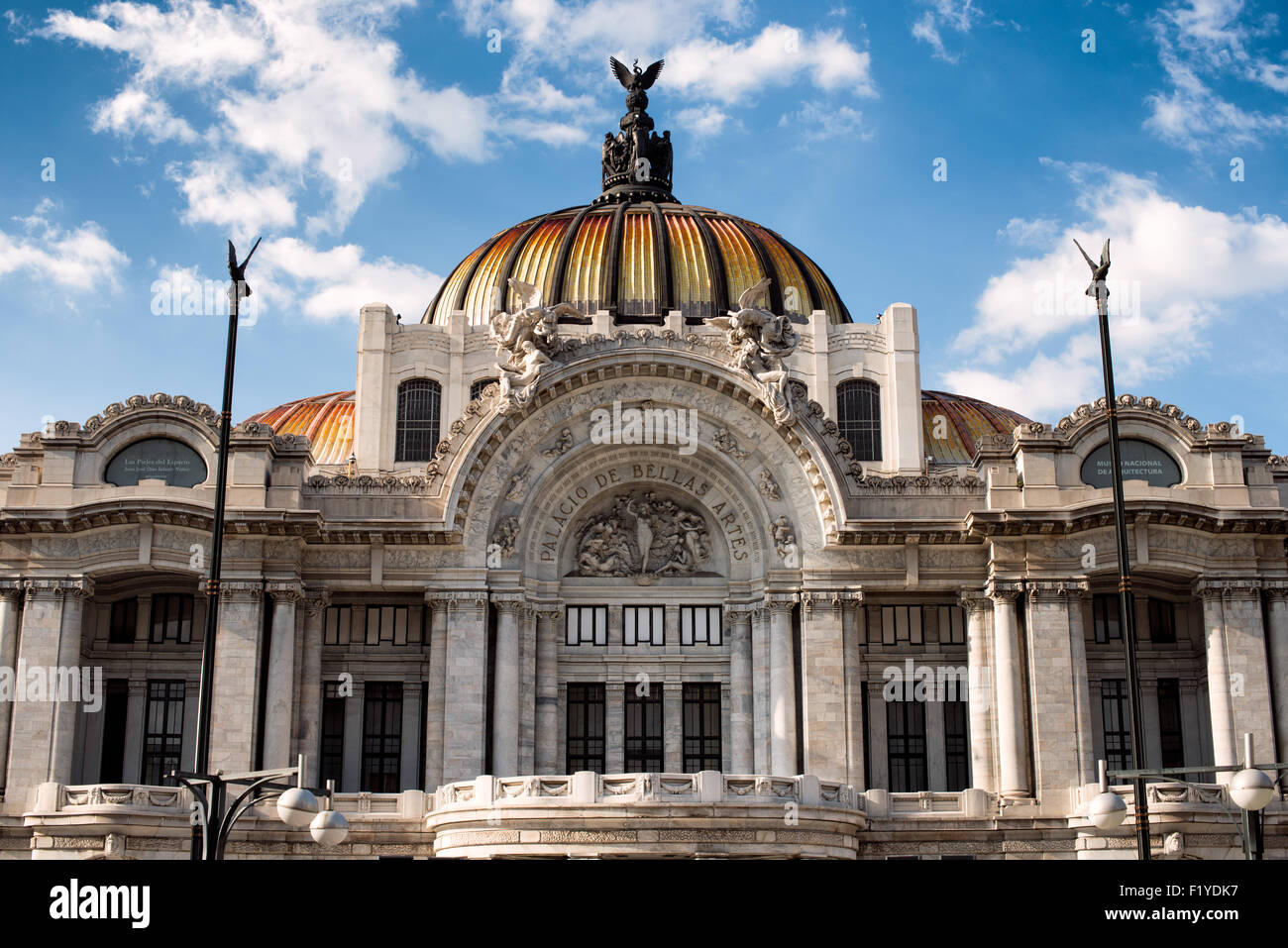 MEXICO CITY, Mexico — The Palacio de Bellas Artes (Palace of Fine Arts) is Mexico's most important cultural center. It's located on the end of Alameda Central park close to the Zocalo in Centro Historico. The building was completed in 1934 and features a distinctive tiled roof on the domes. Stock Photo