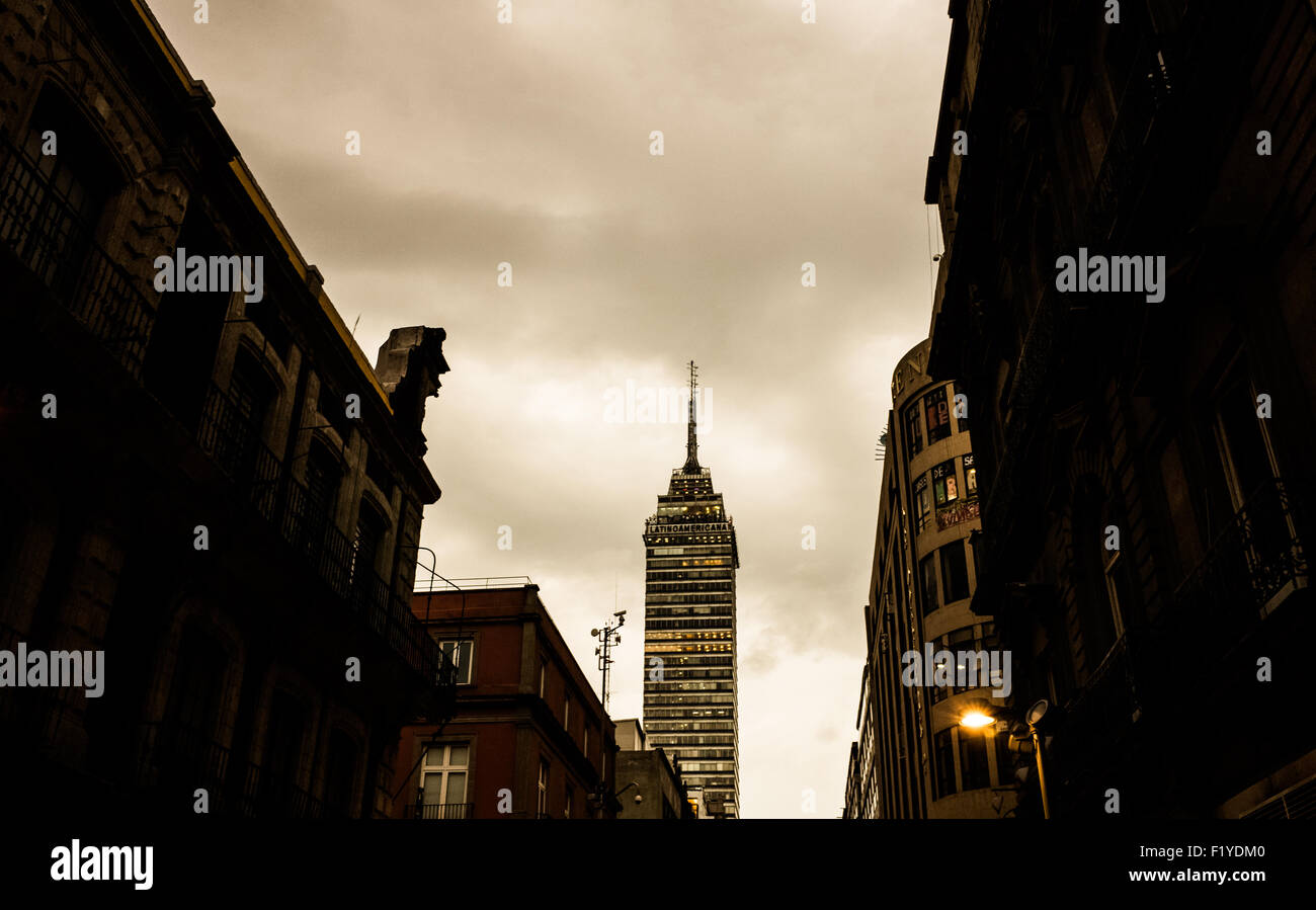 MEXICO CITY, Mexico — The Torre Latinoamericana, an iconic skyscraper piercing the skyline of Mexico City. Completed in 1956, the tower, once the tallest building in Latin America, stands as a testament to the city's architectural innovation and its resilience to seismic activity. Stock Photo