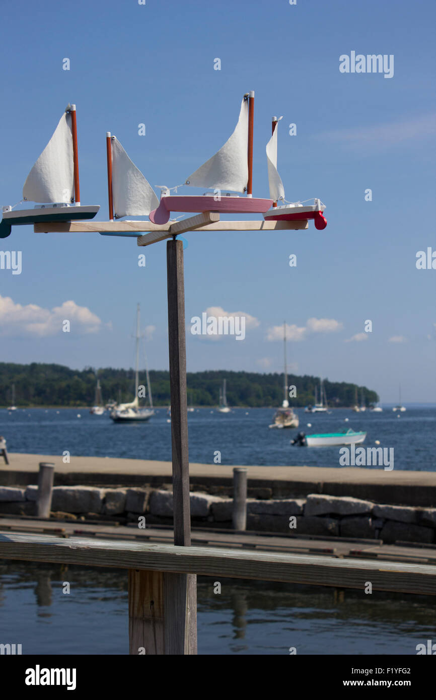 Sailboat whirlygig on a harbor in coastal Maine. Stock Photo