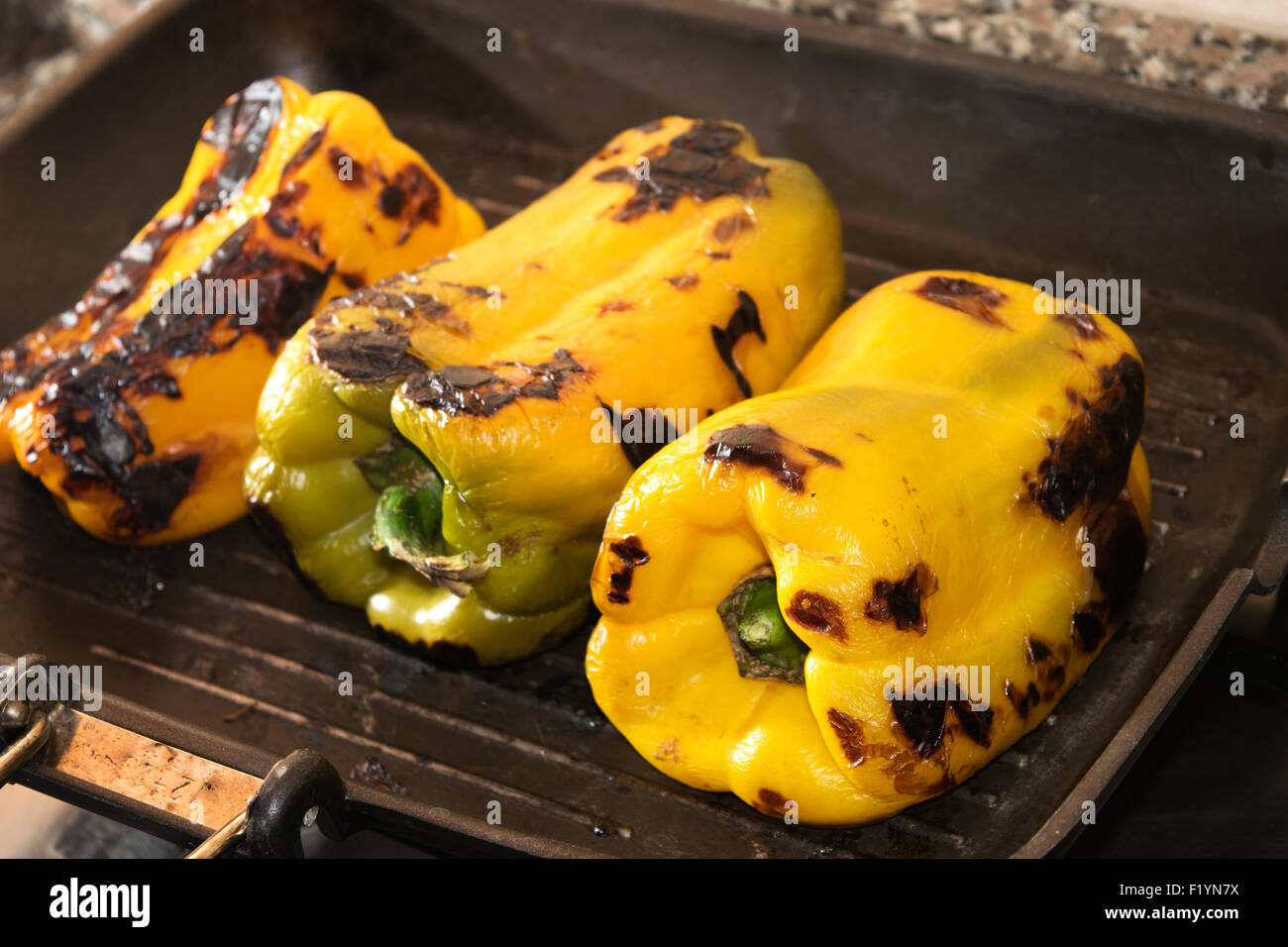 bell peppers grilled on the griddle Stock Photo