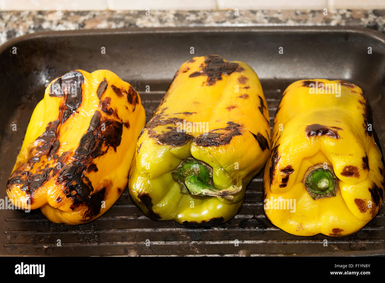 bell peppers grilled on the griddle Stock Photo