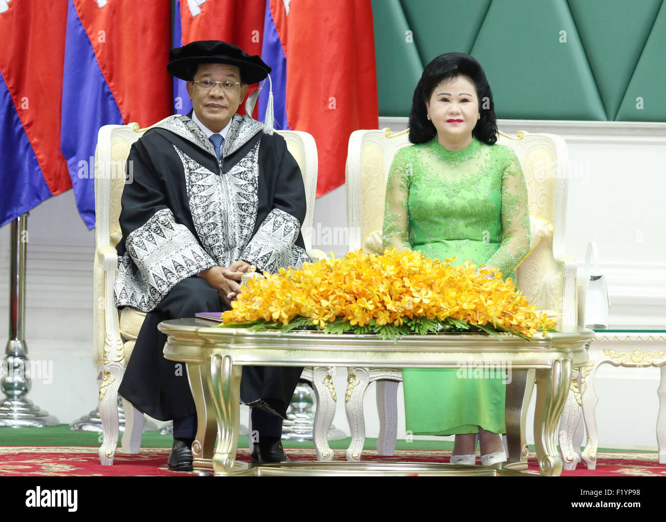 Phnom Penh, Cambodia. 9th Sep, 2015. Cambodian Prime Minister Hun Sen (L) and his wife Bun Rany attend a ceremony in Phnom Penh, Cambodia, Sept. 9, 2015. Malaysia's prestigious Limkokwing University awarded Hun Sen the Honorary Doctorate Degree of Transformational Leadership on Wednesday in a ceremony held at the Peace Palace in the Cambodian capital. © Sovannara/Xinhua/Alamy Live News Stock Photo