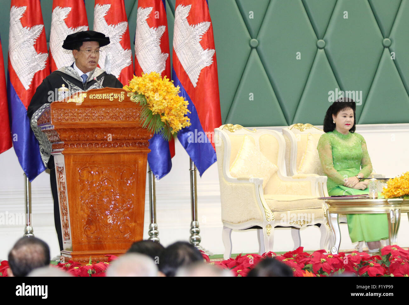 Phnom Penh, Cambodia. 9th Sep, 2015. Cambodian Prime Minister Hun Sen (L) speaks at a ceremony in Phnom Penh, Cambodia, Sept. 9, 2015. Malaysia's prestigious Limkokwing University awarded Hun Sen the Honorary Doctorate Degree of Transformational Leadership on Wednesday in a ceremony held at the Peace Palace in the Cambodian capital. © Sovannara/Xinhua/Alamy Live News Stock Photo