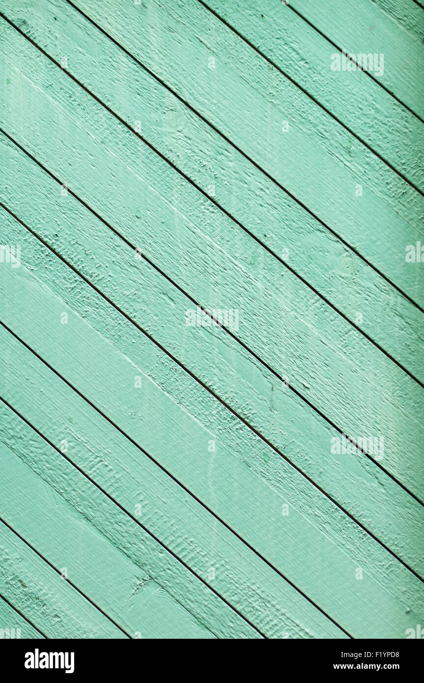 Wooden plank wall painted green, diagonal pattern Stock Photo