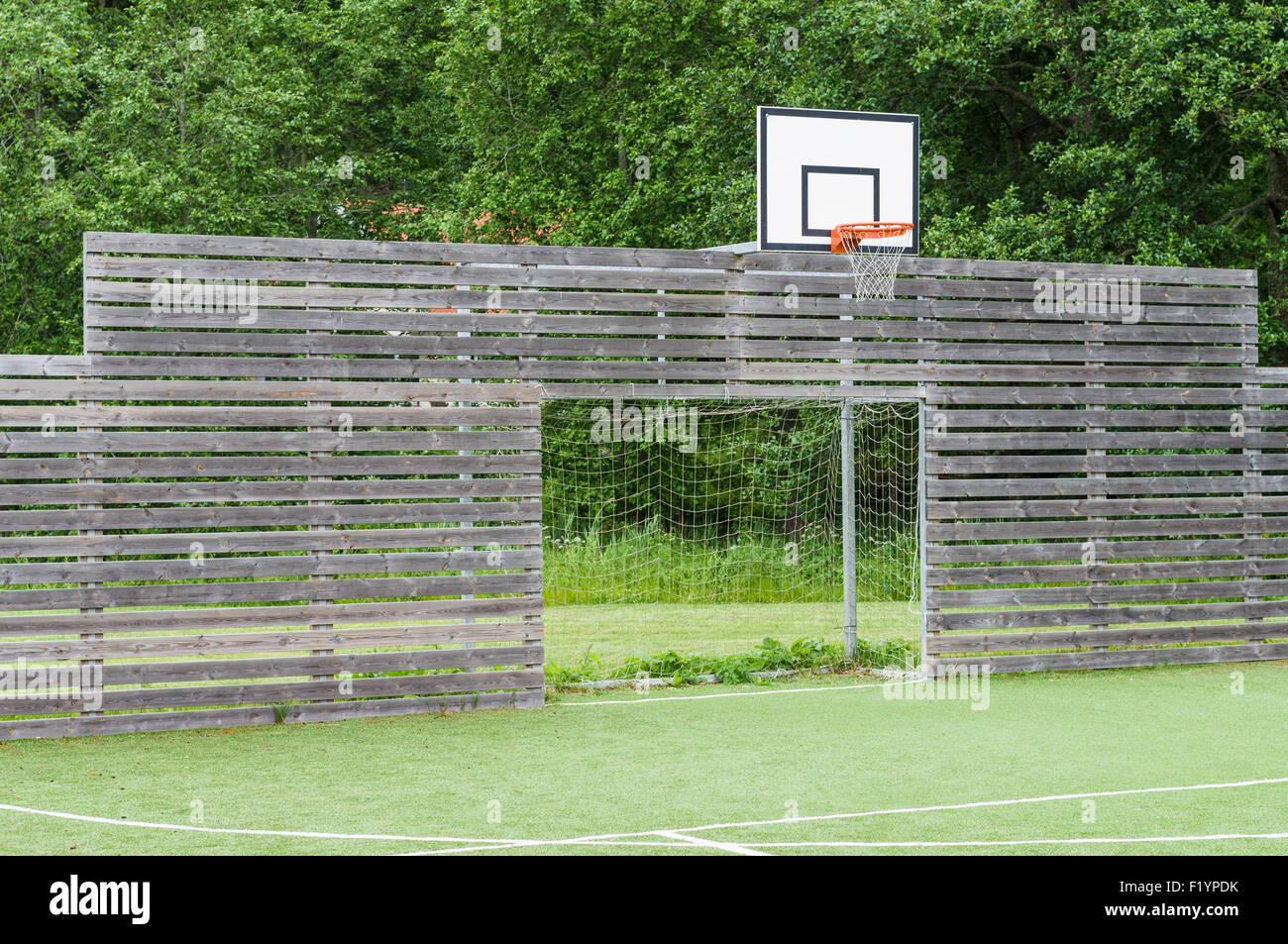 Universal playground synthetic field for soccer and basketball Stock
