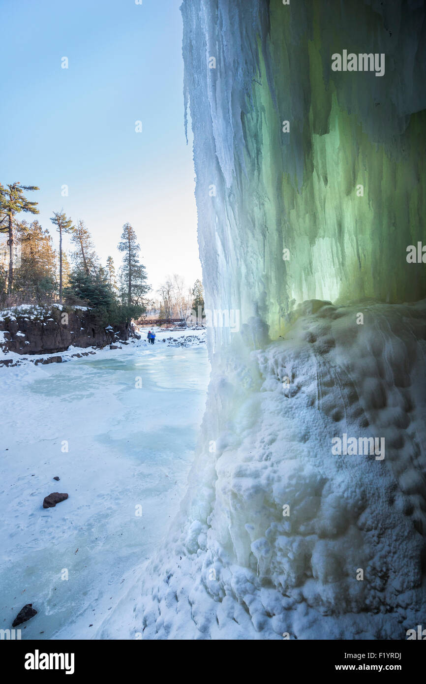 Close up of cascading waterfall turned to ice at Gooseberry Falls in winter, Two Harbors, MN, USA Stock Photo