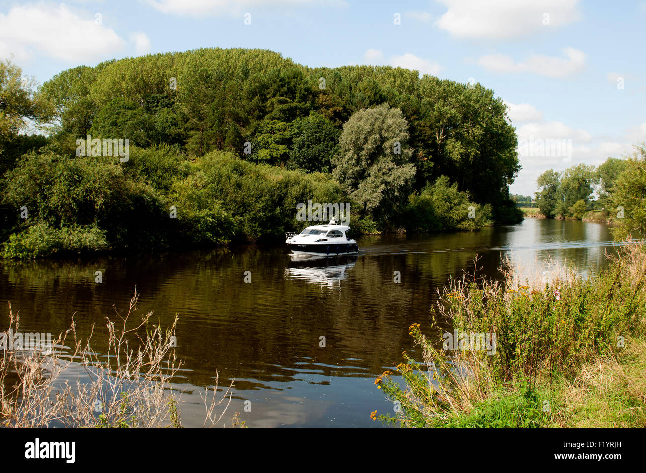 Cabin cruiser on the River Severn at Severn Stoke, Worcestershire, England, UK Stock Photo