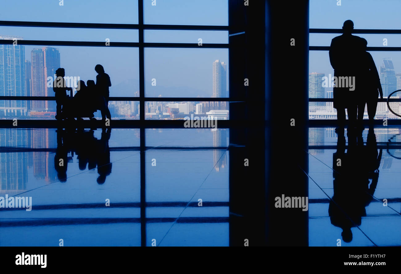 modern building and people silhouettes Stock Photo