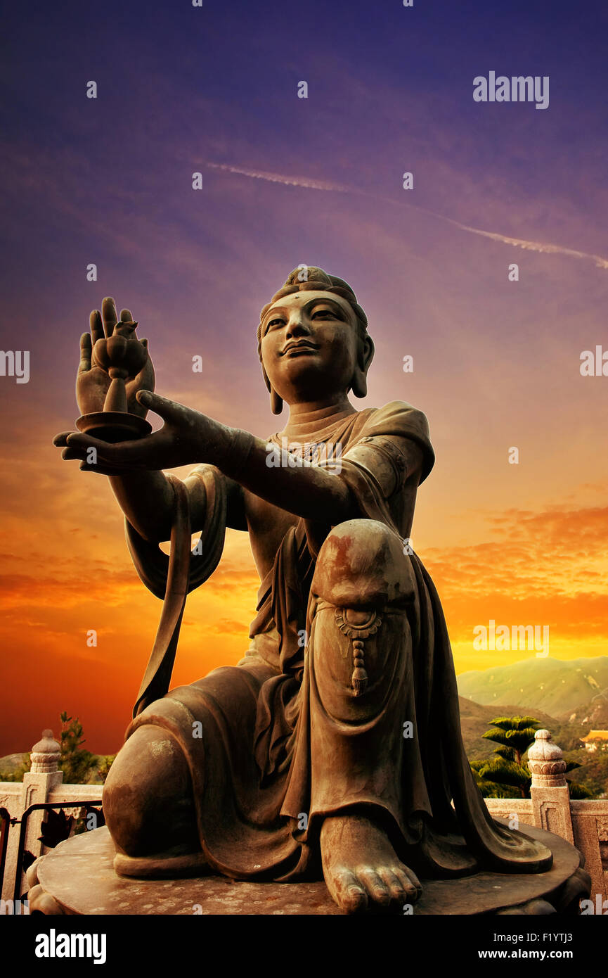 Buddhistic statue praising and making offerings to the Tian Tan Buddha ...