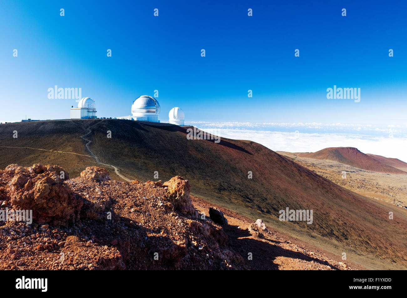 The Mauna Kea skyline showing, from left to right, University of Hawaii 2.2 meter telescope, Gemini Observation, C-F-H telescope Stock Photo