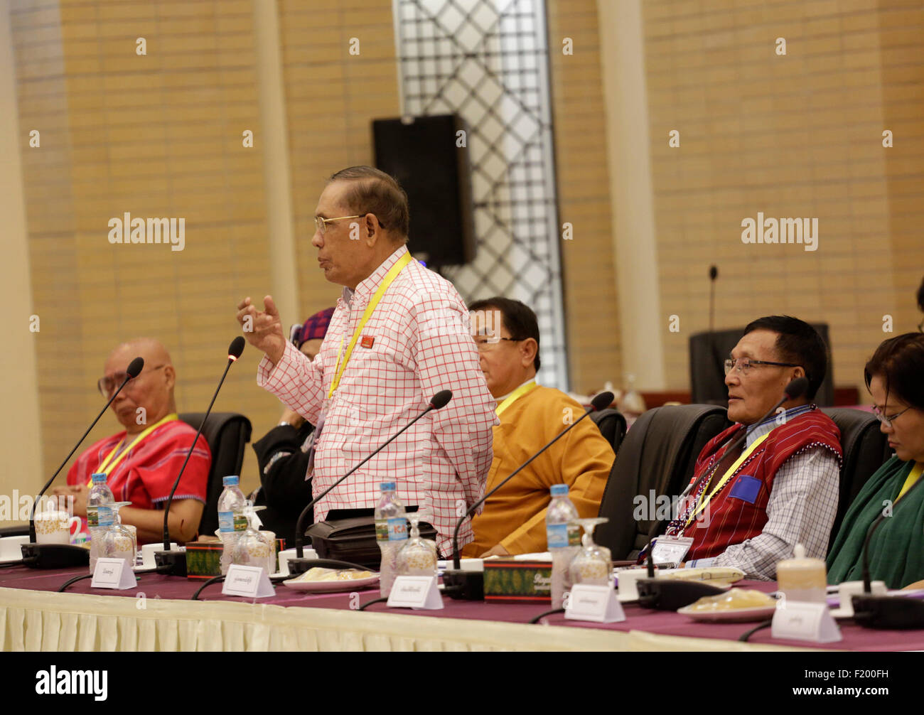 Nay Pyi Taw, Myanmar. 9th Sep, 2015. New Mon State Party (NMSP) chairman Naing Mon Htaw (3rd R) speaks during a meeting of Myanmar President U Thein Sein and nine top leaders of ethnic armed groups at Myanmar International Convention Center in Nay Pyi Taw, Myanmar, Sept. 9, 2015. U Thein Sein on Wednesday urged for signing the almost-finalized nationwide ceasefire accord (NCA) before the end of this month. © U Aung/Xinhua/Alamy Live News Stock Photo