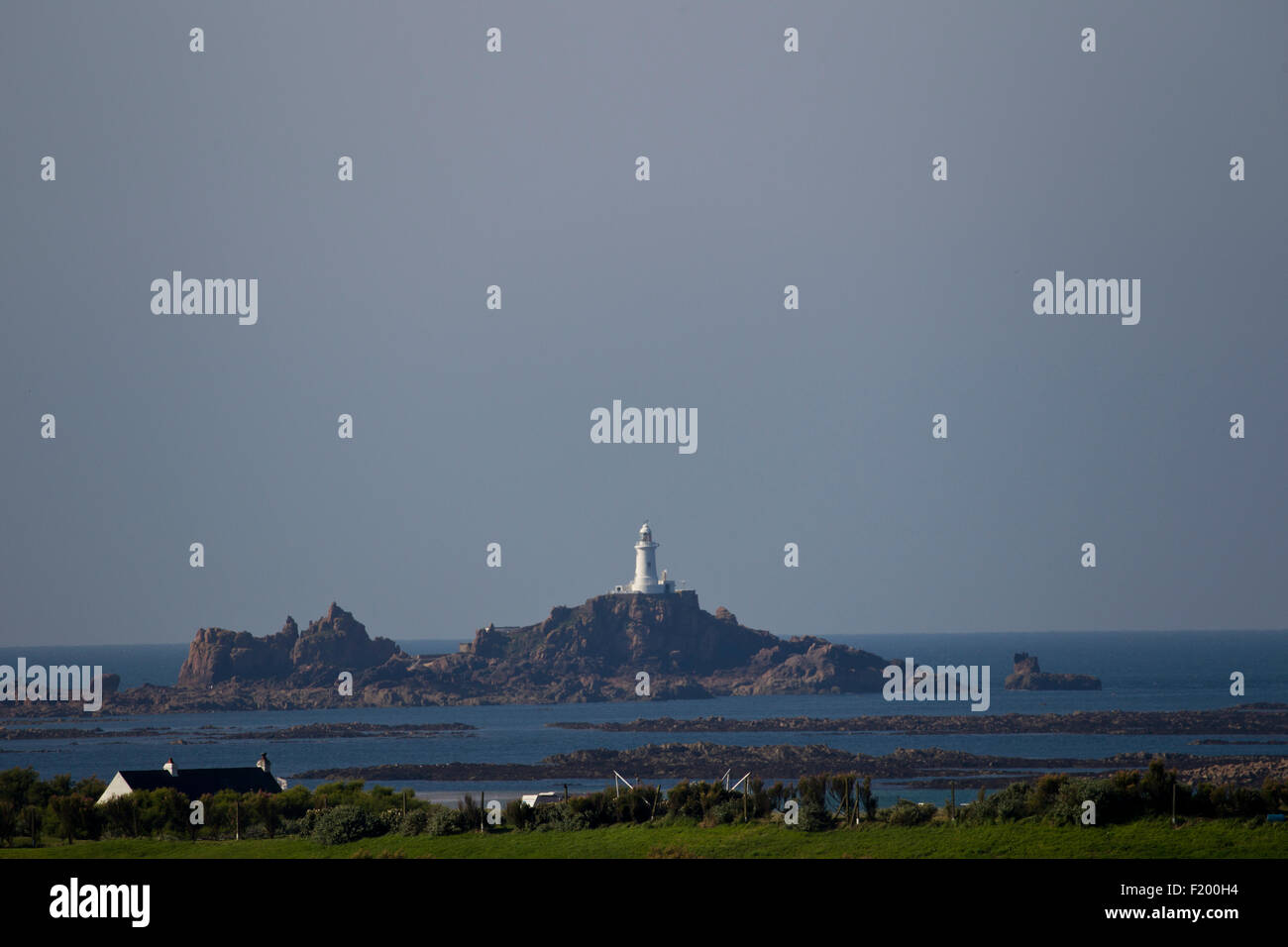 Jersey, Channel Islands, UK. 9th September, 2015. UK Weather. Morning clear  blue skys with forecasted 22C + afteroon ,view of le Corbier Light house  and Le Rocco Tower Credit: Gordon Shoosmith/Alamy Live