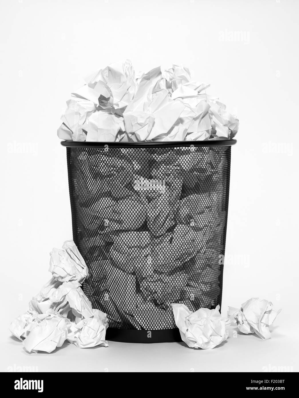 Isolated bin with crumpled paper Stock Photo Alamy