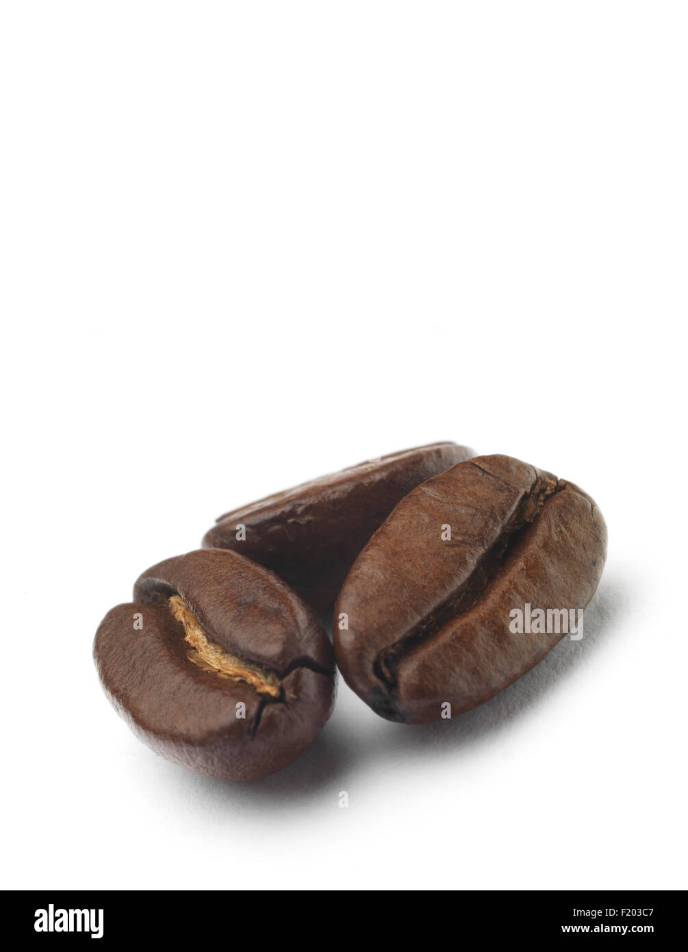 Roasted Coffee Beans isolated on a white background Stock Photo - Alamy