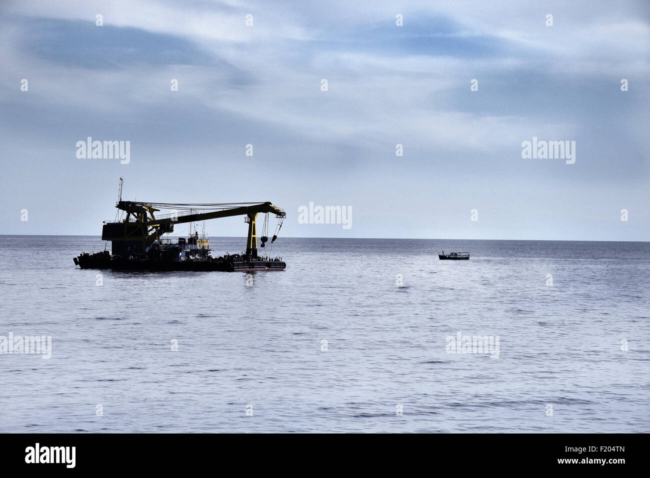 Floating crane in the Black sea Stock Photo