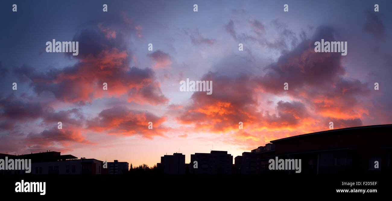 Sunset panorama sky and vibrant clouds Stock Photo