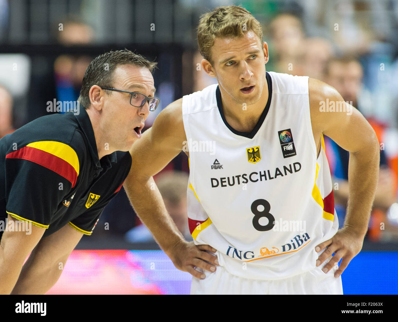 Berlin, Germany. 08th Sep, 2015. Germany's coach Chris Fleming (l) talks to his player Heiko Schaffartzik (r) during the FIBA EuroBasket 2015 Group B match between Germany and Turkey, at the Mercedes-Benz-Arena in Berlin, Germany, 08 September 2015. Germany lost 75:80. Photo: Lukas Schulze/dpa/Alamy Live News Stock Photo
