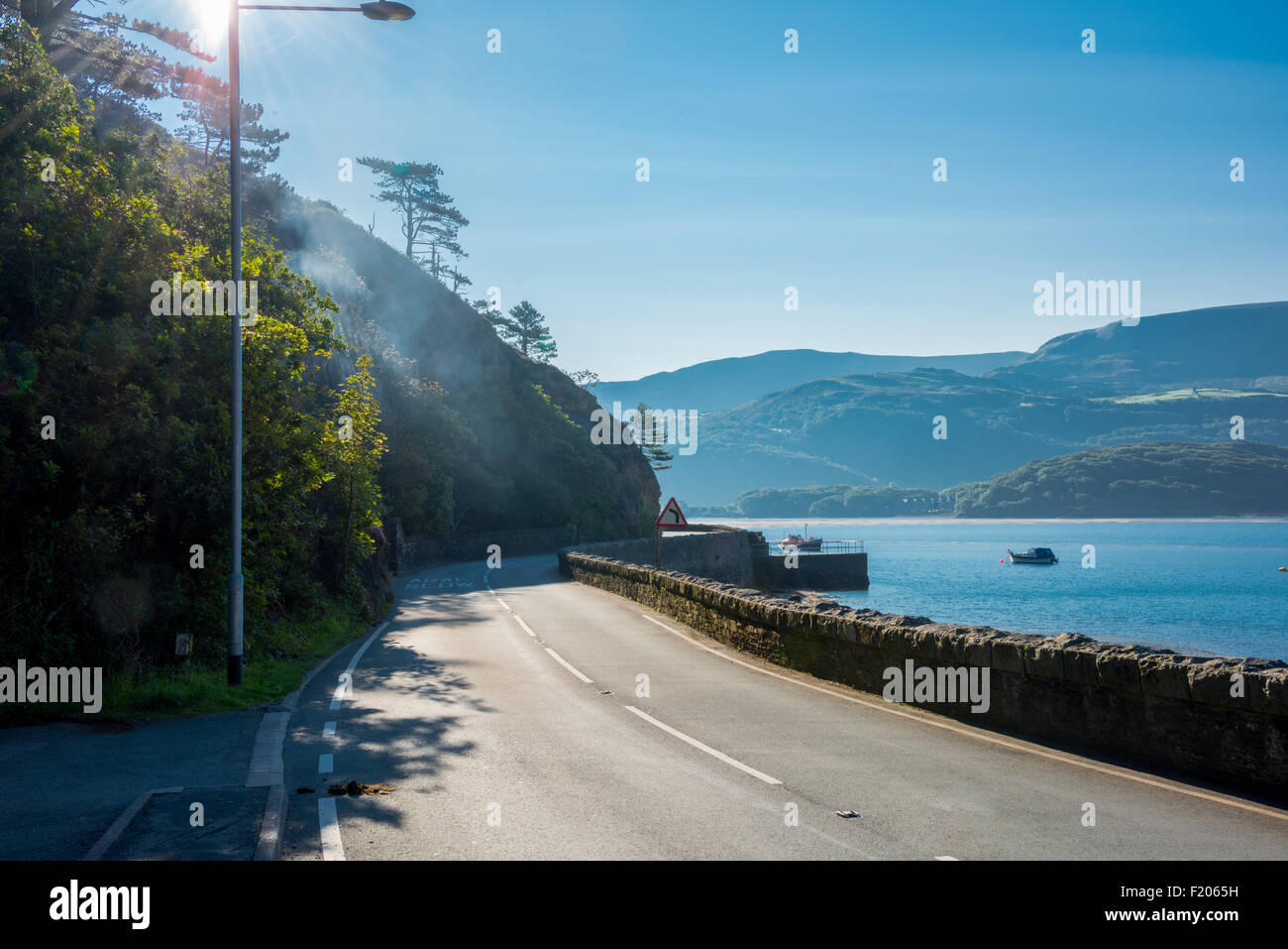 The road along the Harbour into barmouth gwynedd Wales UK Stock Photo