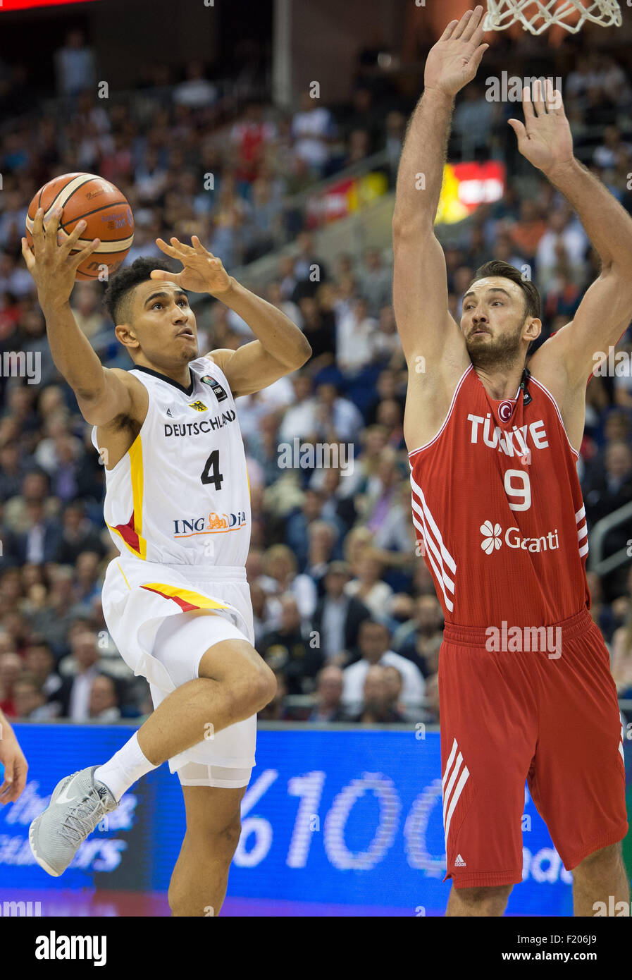 Berlin, Germany. 08th Sep, 2015. Germany's Maodo Lo (l) and Turkey's Semih Erden (r) in action during the FIBA EuroBasket 2015 Group B match between Germany and Turkey, at the Mercedes-Benz-Arena in Berlin, Germany, 08 September 2015. Germany lost 75:80. Photo: Lukas Schulze/dpa/Alamy Live News Stock Photo