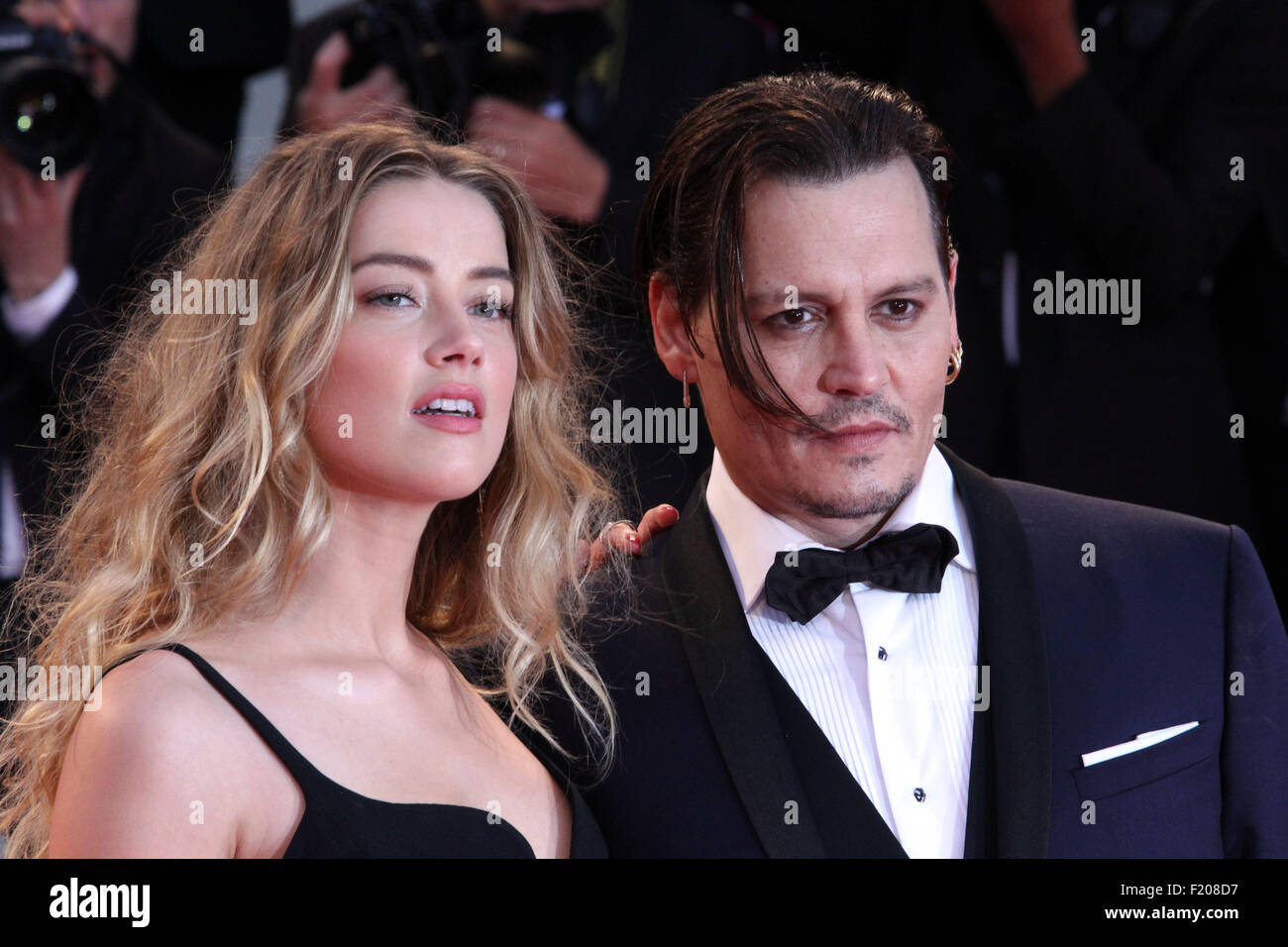 Venice, Italy. 4th September, 2015. Actor Johnny Depp and his wife Amber Heard at the red carpet of the movie 'Black Mass'  presented out of competition for the opening of the 72nd Venice International Film Festival on September 4, 2015 in Venice, Italy    Credit © Ottavia Da Re/Sintesi/Alamy Live News Stock Photo