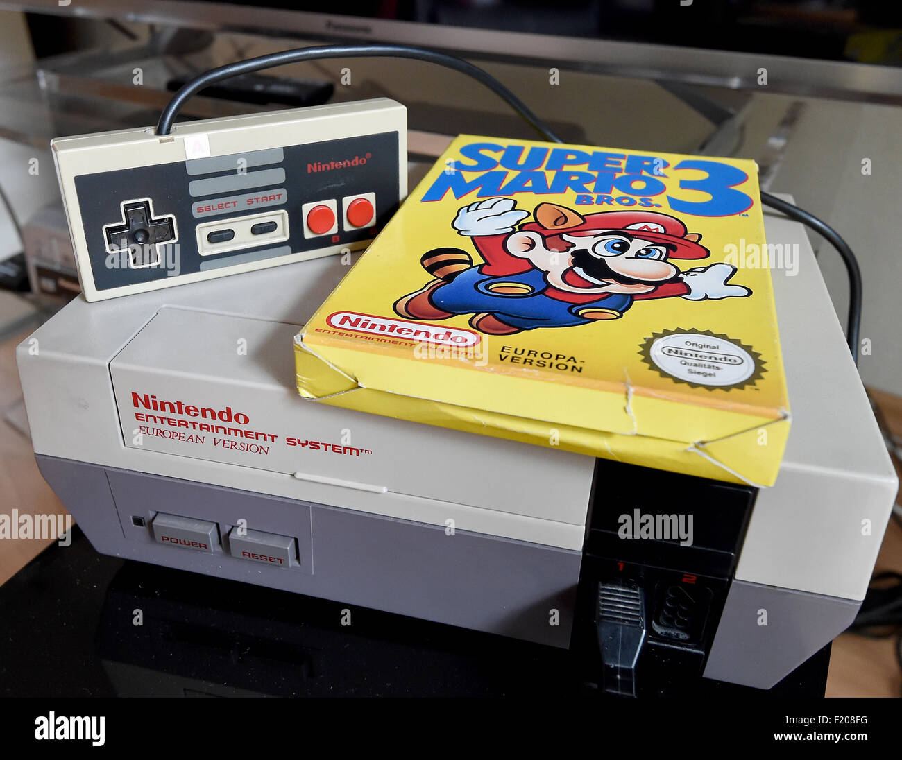 Berlin, Germany. 8th Sep, 2015. A 'Super Mario 3' game is on top of a 1980's