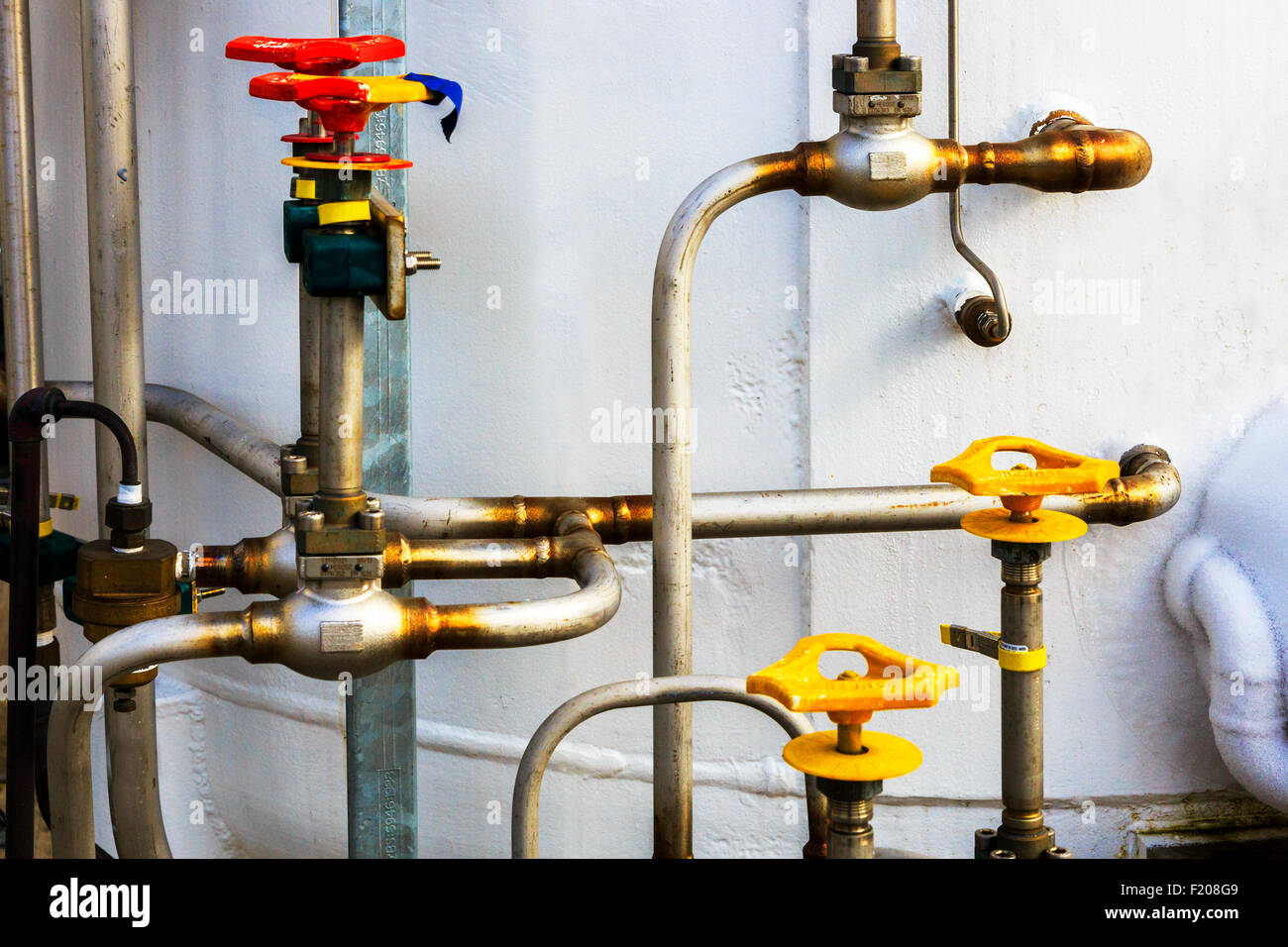 pipes and valves in an engineering structure Stock Photo Alamy
