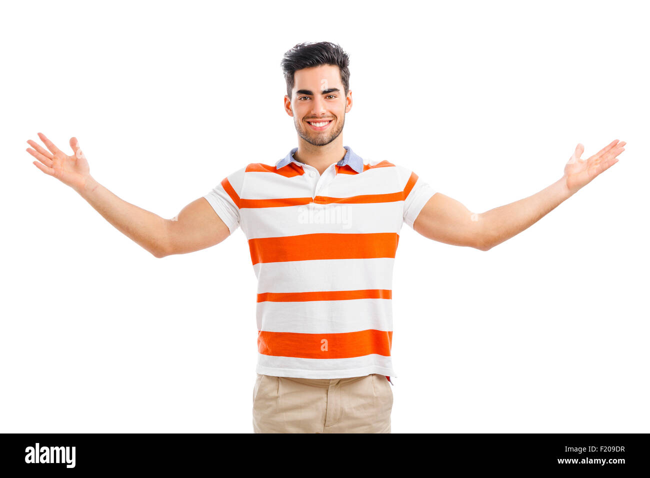 Successful young man with arms wide open, isolated over white background Stock Photo