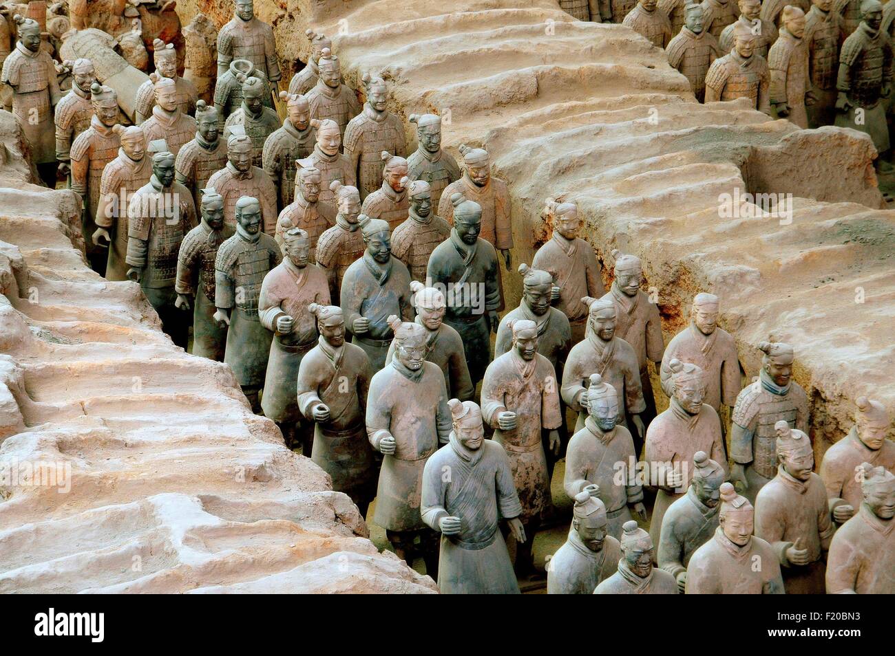 Xi'an, China Soldiers in a silent procession at Pit 1 in the Museum of Terra Cotta Warriors of
