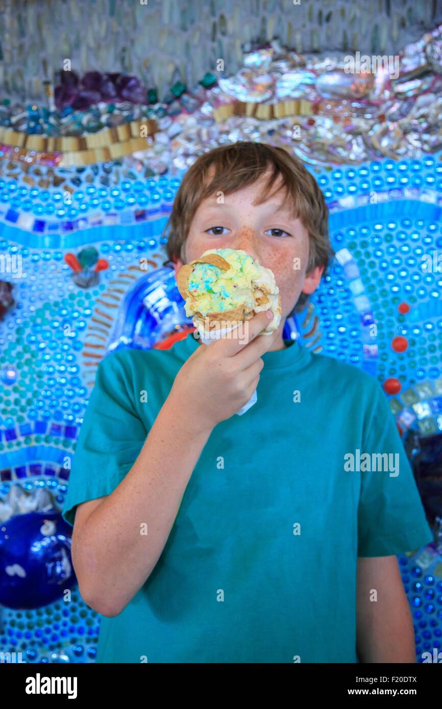 Young boy eating icecream Stock Photo