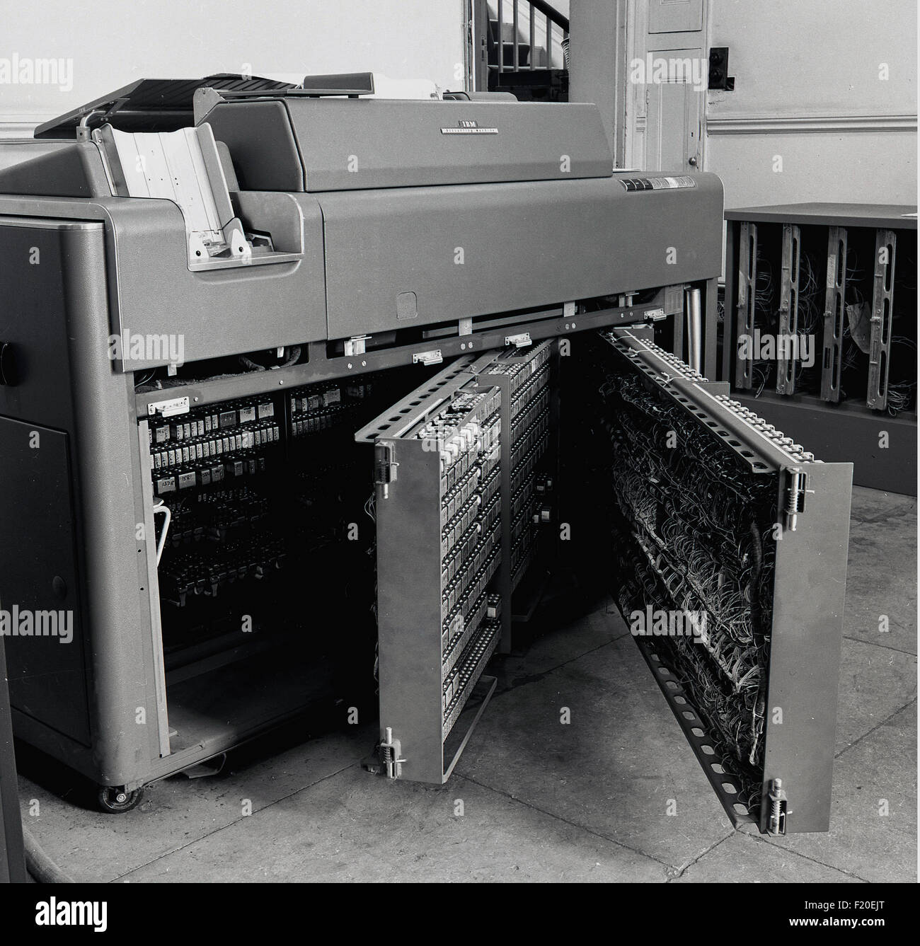 Historical, 1950s, an IBM 402 accounting machine, showing interior  control panels. This large tabulating machine by International Business Machines, read punched cards and was the standard way companies and governments stored and read information. Stock Photo