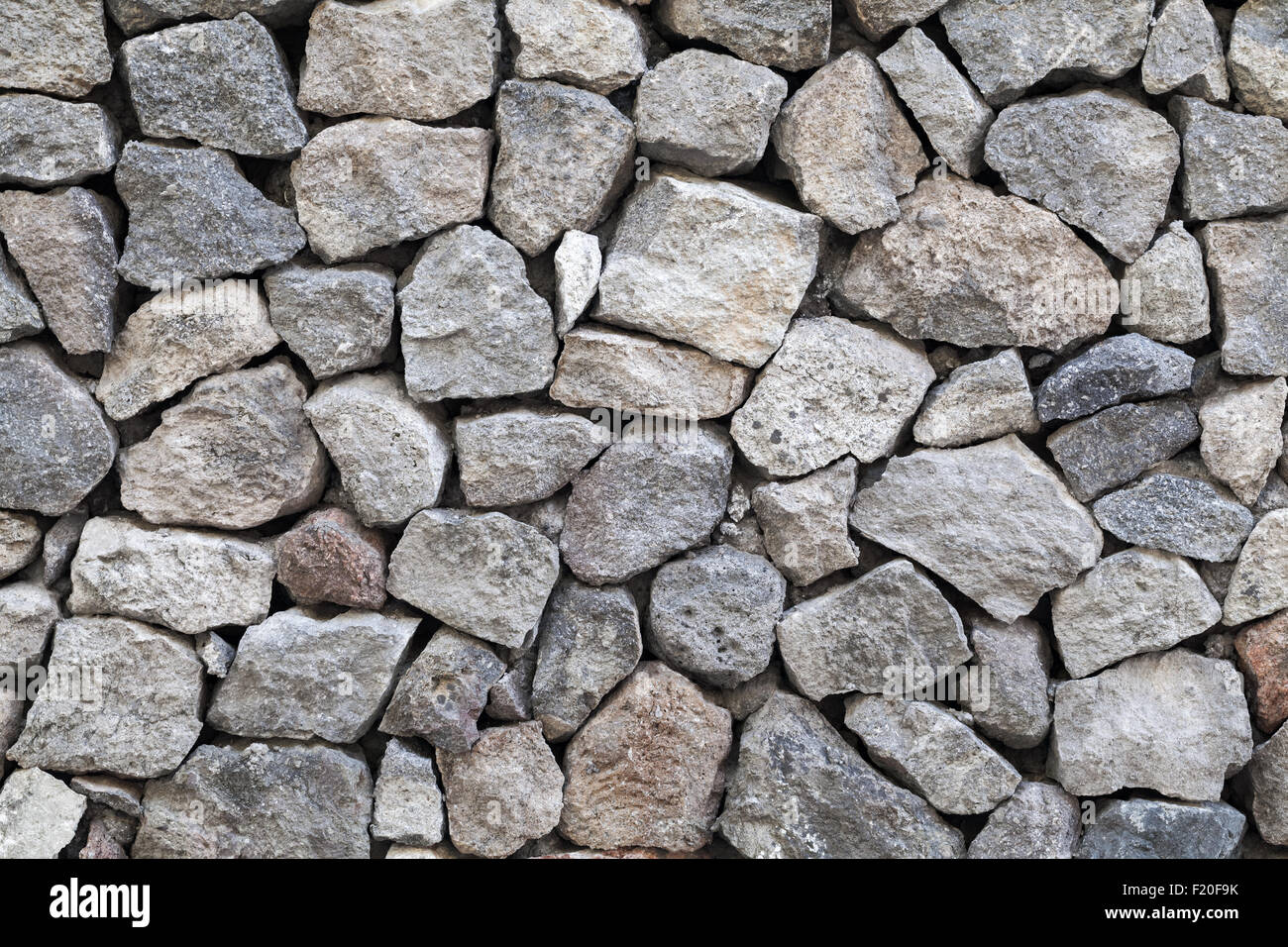 Background texture of gray rough granite stone wall Stock Photo - Alamy