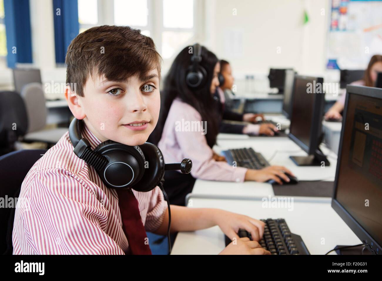 Students using computer in classroom Stock Photo - Alamy