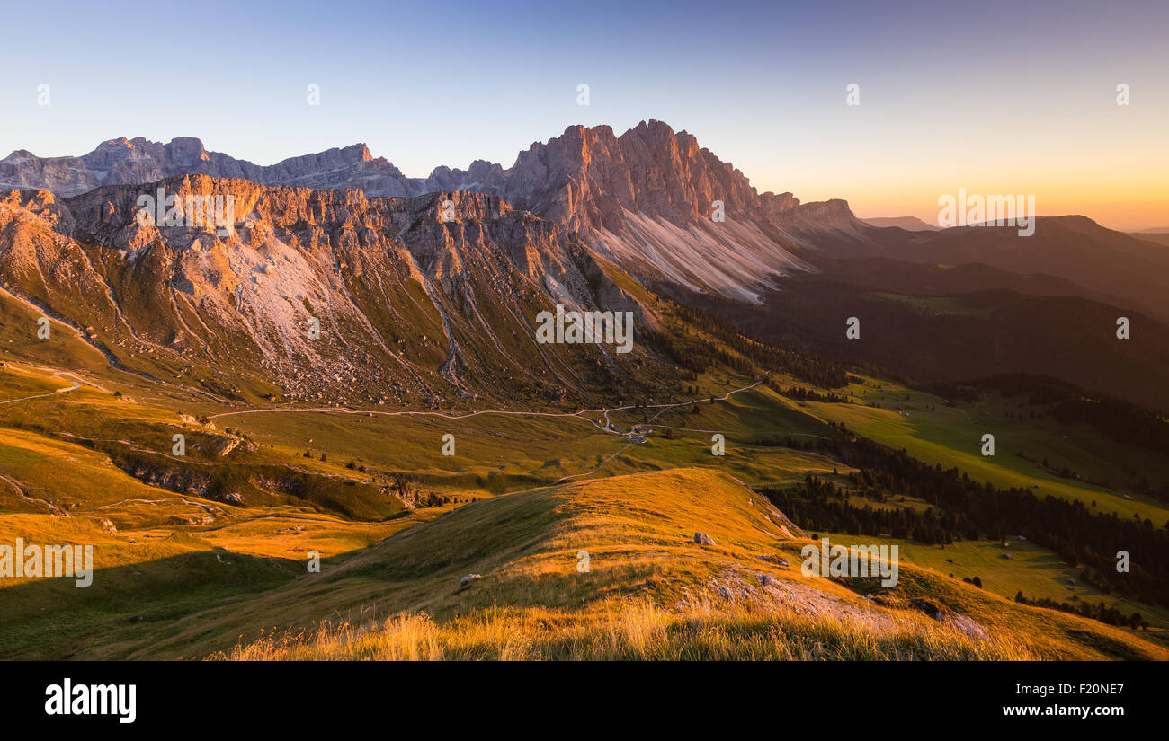 Sunset on the Odle mountain group. View from Col di Poma on the Funes valley. The Dolomites of Puez-Odle nature park. Italian Alps. Europe. Stock Photo