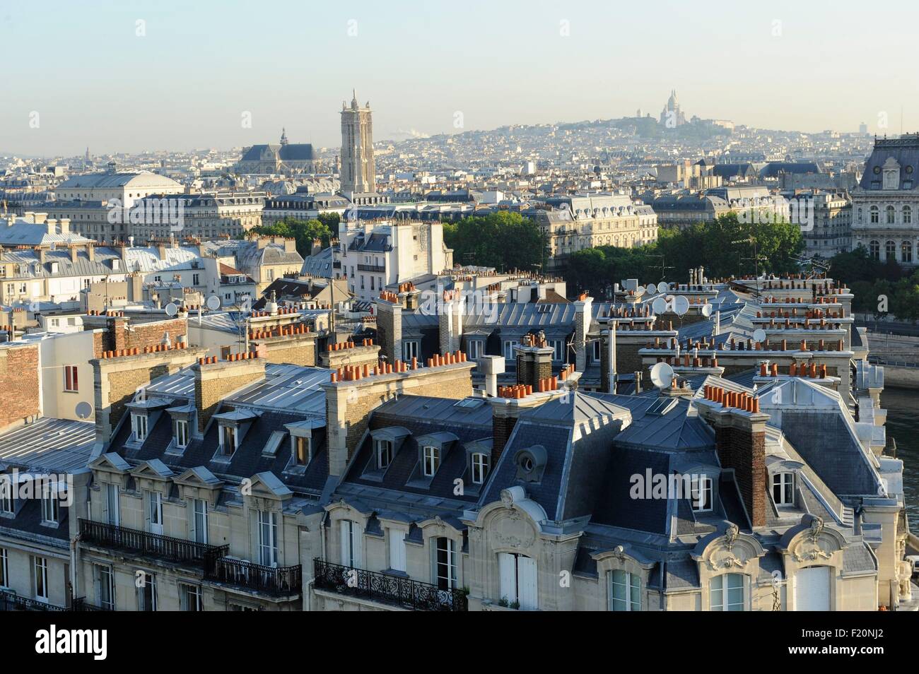 France, Paris, with panoramic views of Paris, in the foreground, the Tour Saint Jacques and le SacrΘ Coeur (aerial view) Stock Photo