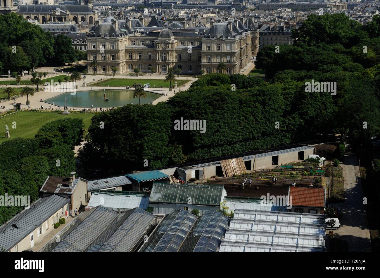 France, Paris, The Luxembourg's gardens in the foreground greenhouses and farther, the buildings of the Senate (aerial view) Stock Photo