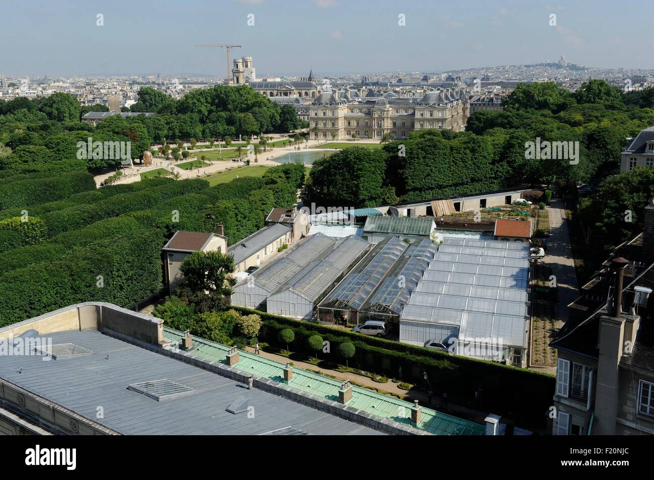 France, Paris, The Luxembourg gardens in the foreground greenhouses and farther, the buildings of the Senate (aerial view) Stock Photo